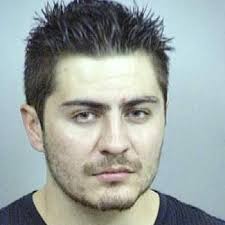 Denver homicide suspect surrenders