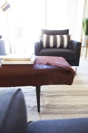 I actually think this is so much cuter than the real sheepskin ones i've. Ikea Hack Cowhide Ottoman Kristi Murphy Diy Blog