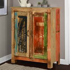 Of, relating to, or typical of country life or country people. Pinkham Rustic Reclaimed Wood Free Standing Storage Cabinet