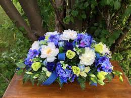 The legs of the saddle are very easy to bend but stiff enough to stay in place once you have fitted it to the marker. Cemetery Saddle Blue White Headstone Saddle Father S Day Cemetery Flowers Artificial Flower Arrangements For Gravestone Made In Canada Cemetery Flowers Artificial Flower Arrangements Memorial Flowers