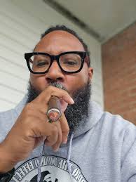 Enjoying the moment with a cigar watching Cigars Daily in the cigar barn.