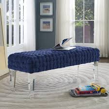 Bedroom corner navy blue velvet bed with soft pillows setting decorated with circular marble night table and navy blue paint wall in the background / cozy interior design. Grazia Woven Navy Velvet Modern Bedroom Bench Contemporary Bedroom Bench