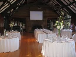 White Linens With Kings Table By Fireplace Kings Table Table Table Settings