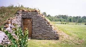 Today's root cellars are often found in basements, or are dug down in the ground or horizontally into a hillside. Root Cellar Built Into Hillside Root Cellar Backyard Homestead Storm Shelter Landscaping