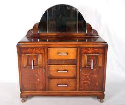 An incredible art deco sideboard with superior construction most likely 1930's or 1940's. Vintage Oak Sideboard Art Deco Credenza Antique Mirrored Buffet 1930s Art Deco Sideboard Art Deco Credenza Mirrored Buffet