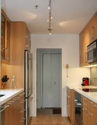 The floor plan opens up to a wide dining room area further enhancing the galley kitchen design. Ceiling Lighting For Galley Kitchen Novocom Top