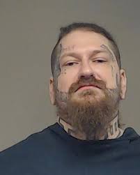 North Texas man with ties to white supremacist group sentenced to life in  prison for firing at officer