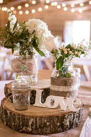 Bohemian Chic Wedding Decorations These Budget Friendly Ideas From Celebrity Weddings Bridalgui Rustic Wedding Wedding Centerpieces Rustic Barn Wedding