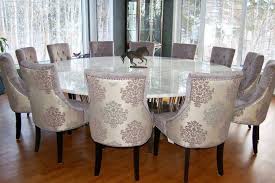 Every thanksgiving my small dining room table that normally seats 6, gets extended to seat up to 14 with the help of a handy piece of plywood that my i cover the dining table with a blanket to protect it from scratches. 40 Official Dining Room Chair Styles Diningroomdesign Diningroomchairs Formaldiningroo Large Dining Room Table Round Dining Room Table Square Dining Tables