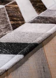 Onloom Kuhfell Teppich Husked Chevron Mit Dem Fellteppich Husked Chevron In Weiss Braun Holen Sie Sich Einen Wahren Hingucker In Ihre Vier Wande Entworfen Design