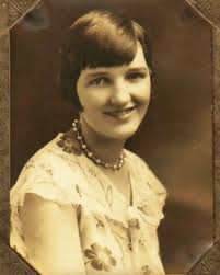 In late May, 1915, Kansas Grain, built their elevator along the main line  of the Santa Fe Railroad. (Elevator in the foreground) Smack dab between  two towns which already had elevators belonging