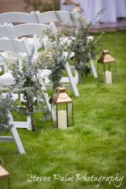 Simple Organic Ceremony Aisle Decor With Lanterns And Greens Rustic Tucson Wedding Wedding Aisle Decorations Gazebo Wedding Decorations Unique Wedding Flowers