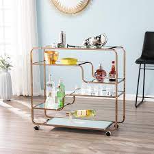 Handles can also be used to hang complementary towels and 2 of the 4 wheels lock. Carson Carrington Stovring Champagne Gold Mirrored Bar Cart N A