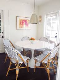 Great Pairing Of The Classic Saarinen Tulip Table With Some French Inspired Cafe Chairs From Serena And Lily Bistro Chairs French Bistro Chairs Home