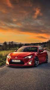 We choose the most relevant backgrounds for different devices: Toyota Gt86 Car Red Color Sheep Houses 640x1136 Iphone 5 5s 5c Se Wallpaper Background Picture Image