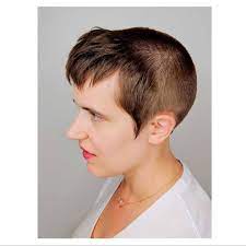 Young Woman With Chelsea Haircut Buzzcut With Long Bangs