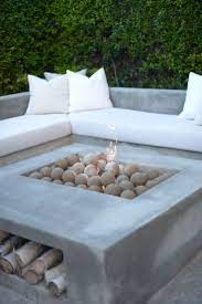 I Like The Use Of Cement The Square Shape And The Underneath Wood Storage For This Fire Pit I Do N Outdoor Renovation Backyard Seating Backyard Seating Area