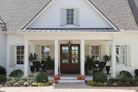 The white paint will contrast against the dark roofing materials and surrounding modern farmhouse exteriors typically follow a monochromatic color scheme, which is where colorful landscaping comes into play. 91 Farmhouse Exterior Ideas House Exterior Exterior Farmhouse Exterior