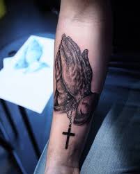 Maybe you would like to learn more about one of these? Praying Hands Tattoo With Meaning Jesus Hand Tattoo With Rosary