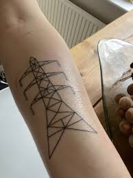 Image result for quirky pylon forehead tattoo
