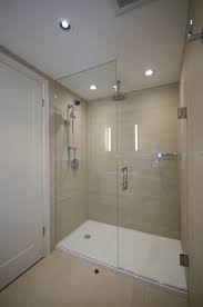 You could have the other walls solid. Large Shower Enclosure With Custom Glass Shower Enclosure Beautiful Bathroom Renovations Glass Bathroom