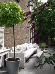You Don T Need A Big Garden To Enjoy Garden Living Clever Use Of Footstool Sneaky Nap In The Sun Table Wine Gl Kleiner Garten Garten Franzosischer Garten