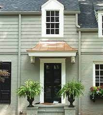 Attached to the end of the home is a 24' long carport. Front Entry Awnings Google Search Awning Over Door Front Door Awning Door Overhang