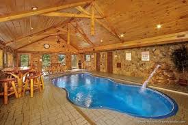 Our pigeon forge and gatlinburg cabins are conveniently located near the best attractions, like dollywood and ripley's aquarium, shopping. 5 O Clock Somewhere Is A Spectacular Cabin In Pigeon Forge With A Pool Gatlinburg Cabin Rentals Cabins In Gatlinburg Tn Smoky Mountains Cabins