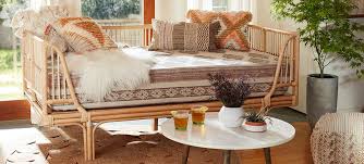 To accomplish this worldly look, find furniture that is built with several different materials. Laid Back Boho World Market