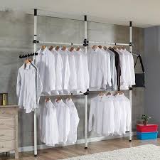 It boasts a length hanging rail, storage space above, and a drawer below. Telescopic Garment Rack Premium Heavy Duty Movable Coat Hanger Clothes Wardrobe 3 Poles 4 Bars Hanging Rail Storage Shelving Adjustable Height 160 320cm Walmart Com Walmart Com