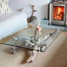 This very contemporary table can be as big or small as you want, as long as you can find a stump! Another Creation By My Husband A Driftwood Coffee Table Driftwood Table Driftwood Coffee Table Scottish Decor