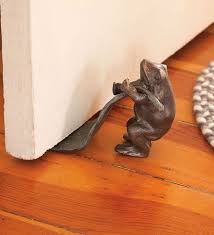 Stylish Decorative Door Stops With Cool Brown Bronze Frog Door Stop Stunning Bronze Leaf Pulled By Frog And Natural Wove Animal Doorstop Door Stops Door Stop