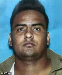 Dozens of vehicles are seen driving past hit-and-run victim who was left  lying in the middle of road