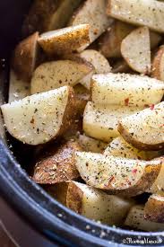 Crockpot Roasted Potatoes Are Russet Potatoes Roasted In A Crockpot Or Slow Cooker With Garlic Crockpot Roasted Potatoes Crockpot Roast Potato Recipes Crockpot
