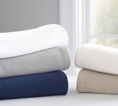 Perfect for your couch, chair, or bed. Diamond Organic Cotton Throw Blanket Pottery Barn
