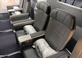 The aircraft cabin in three class configurations has 305 passenger seats. What To Expect In American Airlines Premium Economy To Hawaii Runway Girlrunway Girl