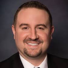 What are the best practices for implementing number codes or wrist bands in  a 12u travel team?