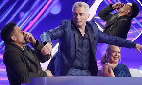 'doctor who' star john barrowman has been installed as the bookmakers' favourite to win 'dancing on ice' after just one live performance. Dancing On Ice John Barrowman Accidentally Slaps Ashley Banjo Across The Face Daily Mail Online