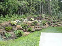 Klein S Lawn Landscaping Landscapes Designed Landscapes Hillside Landscaping Landscaping With Rocks Steep Hillside Landscaping