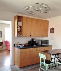industrial lighting gives 1950s kitchen