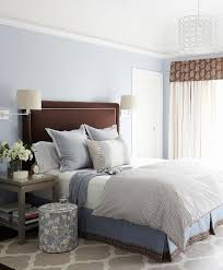 Brown And Blue Bedroom With Gray Nightstands And Gray Trellis Rug Transitional Bedroom Blue Bedroom Walls Brown Headboard Blue Bedroom