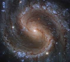 It is believed that this galaxy consumed another smaller galaxy to become the large and beautiful spiral that we observe today. Barred Spiral Galaxy Hogewash