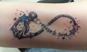 The quote i refuse to sink is also written here, this tattoo is across the back. I Refuse To Sink Forearm It Had Flower And I Had Her Change Them To Stars I Love It Body Art Tattoos Forearm Tattoos Tattoos