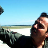 Captain Eduardo Emnanuelli, 198th Tactical Fighter Squadron, 156th Tactical  Fighter Wing, conducts a preflight inspection of his A-7 Corsair II  aircraft during exercise BOLD EAGLE '82