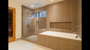 Rather than covering this fireplace surround in dark brown tiles that match the wall and the furniture in the room, the strategy here was to go for a light beige tile that highlights the fireplace and turns it into a vivid focal point for the space. Bathtub Tile Surround Ideas For 2015 Youtube