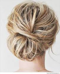 The Best Way To Handle Long Hair Is By Tying Into Low Messy Bun Hairstyles Rather Than A Ponytail Which W Hair Styles Medium Hair Styles Up Dos For Medium Hair