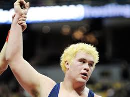 MU football recruit throws weight around