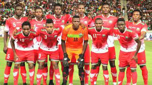 Harambee stars' hassan abdalla (l) shields the ball from isaac muleme of uganda cranes during a 2022 world cup qualifier match at nyayo . Harambee Stars To Battle Mo Salah And Co In Road To 2021 Afcon