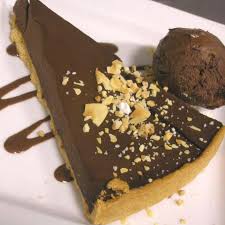 La Tarte Au Chocola Au Lait De Noisette Et A La Pulpe De Framboises De Carofr19 Recette Chocolat Recette Tarte Chocolat Tarte Au Chocolat