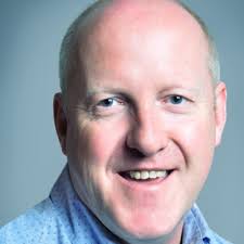 Adam MacMillan (he/him)